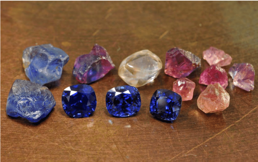 ough and faceted blue and pink orange sapphires and a diamond crystal from Mandraka/Toamasina. Photo © Vincent Pardieu / GIA