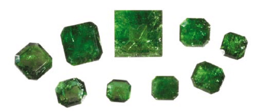 These stones, which range from 0.28 to 1.87 ct, are part of the group of 36 cut Sandawana emeralds examined for this study.